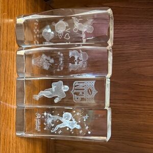 Set a four tall crystals with etchings